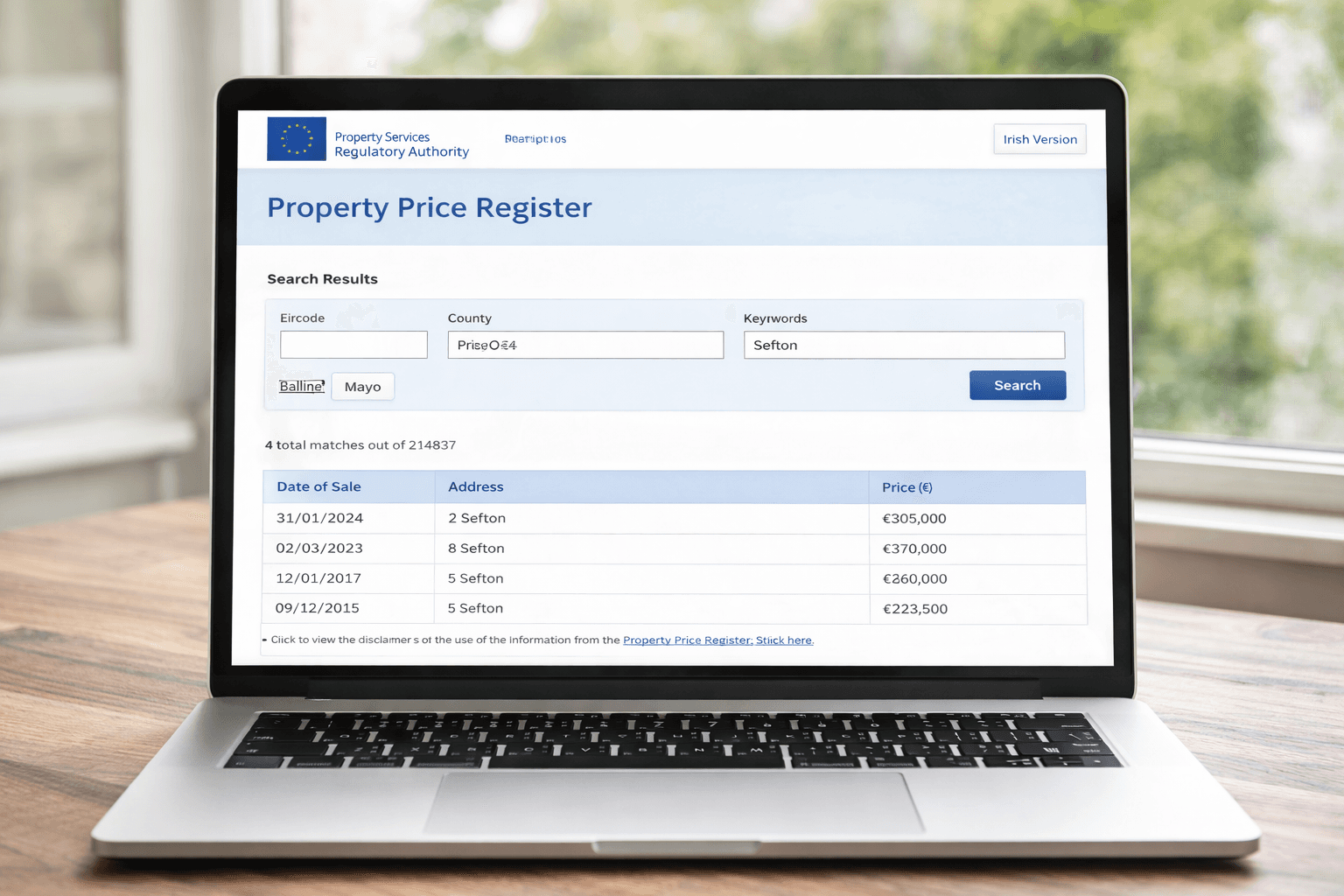 A laptop screen showing the Irish Property Price Register search results for a residential street.